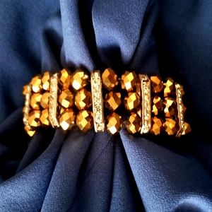 Gold/bronze-coloured beaded bracelet